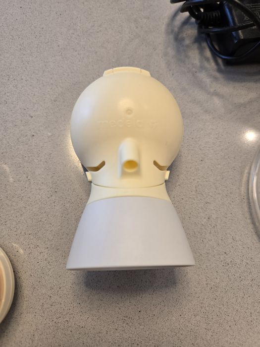 Bomba eléctrica tira leite