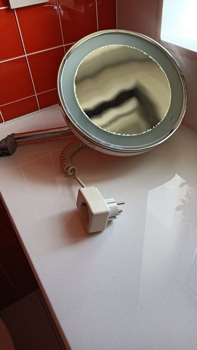 Espelho de aumento eléctrico