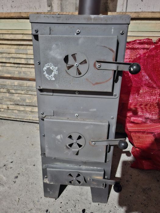Piecyk - Koza - Kominek do garażu na budowę  jak nowy