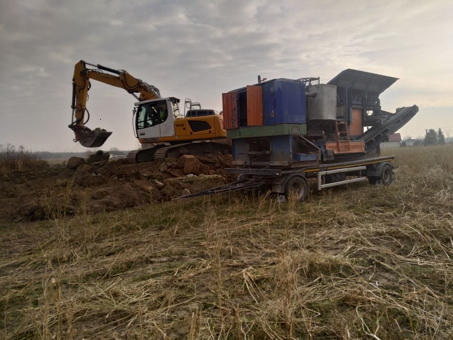 Usługi kruszarką-wyburzenia. Kucie młotem hydr.
