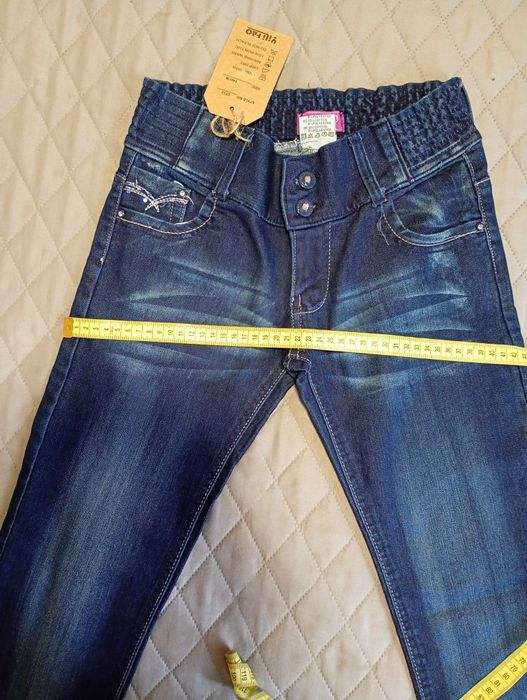 Джинсові штани на дівчинку