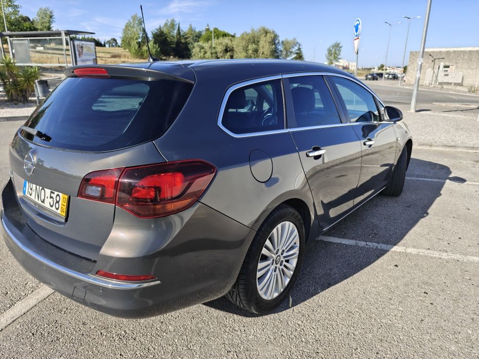 Opel Astra Aporte Tourer 2013 — photo 2