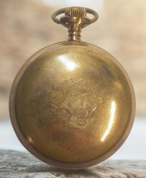 Relógio de bolso, banhado a ouro de 1912-1913.