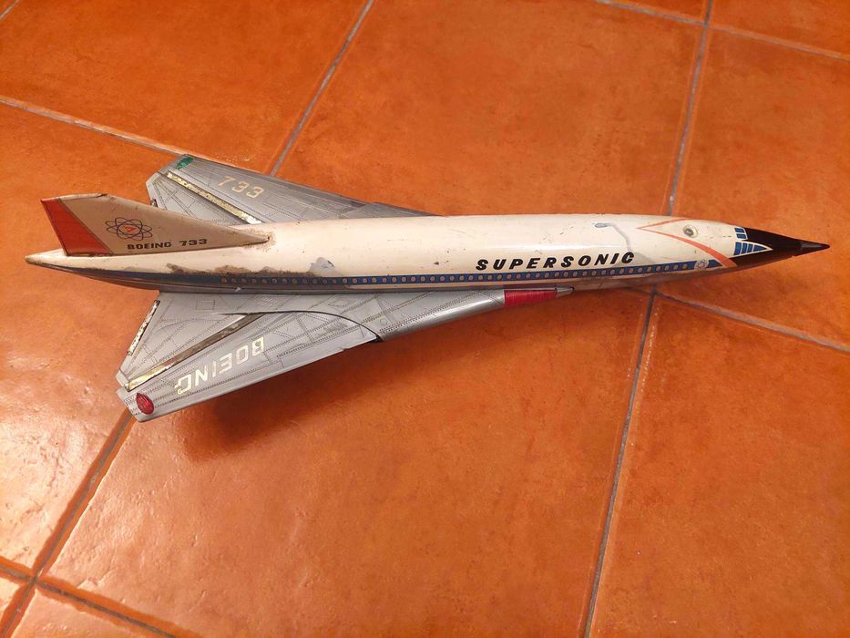 Battery-powered toy airplane in tin box. Yonezawa, Japan