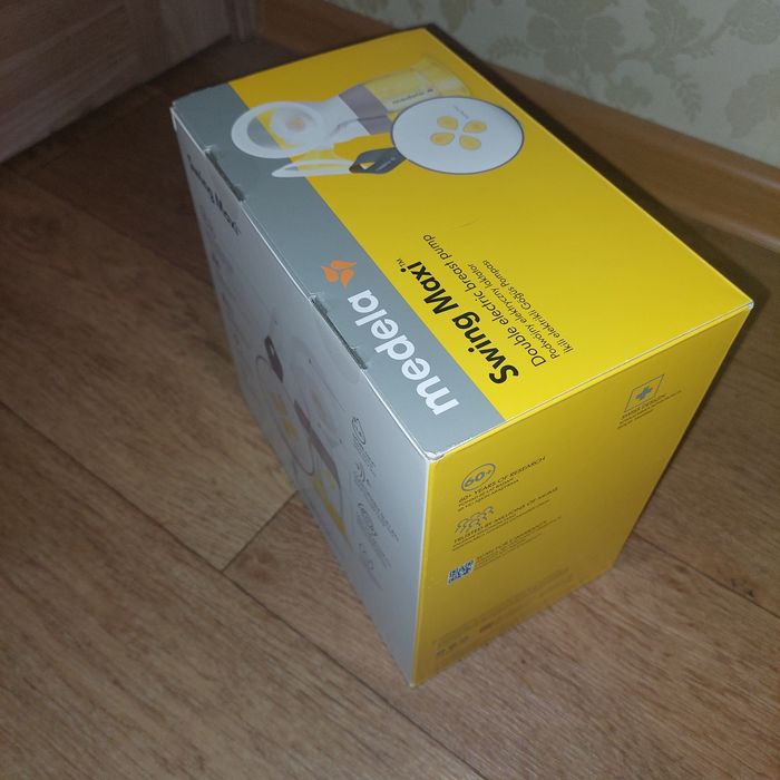 двойной электрический молокоотсос Medela Swing Maxi