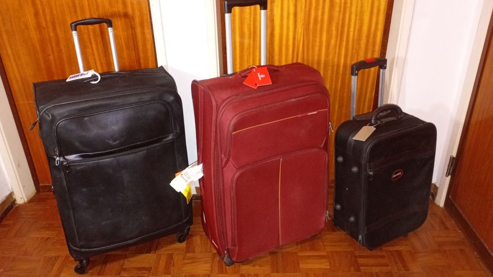 Conjunto de três malas de viagem
