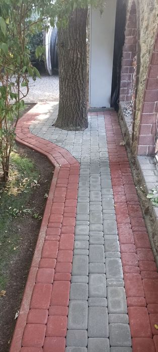 Укладня бруківки, (тротуарної плитки))