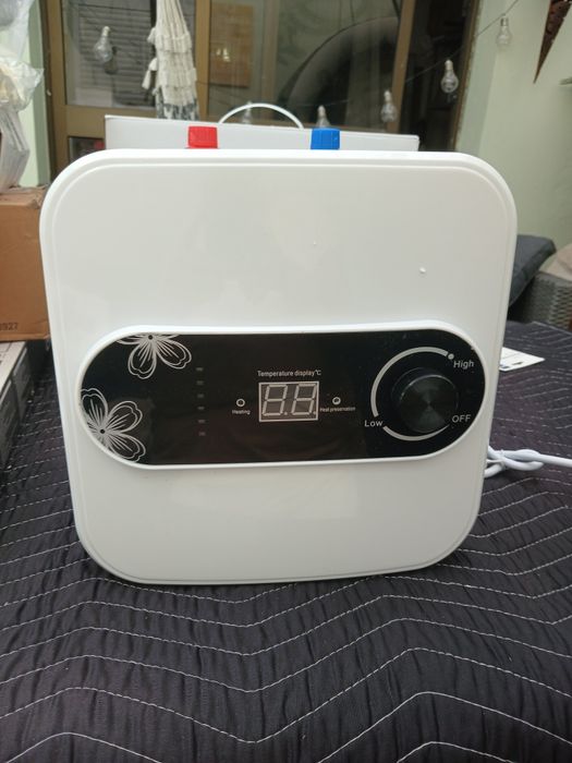 Mini esquentador, electrico