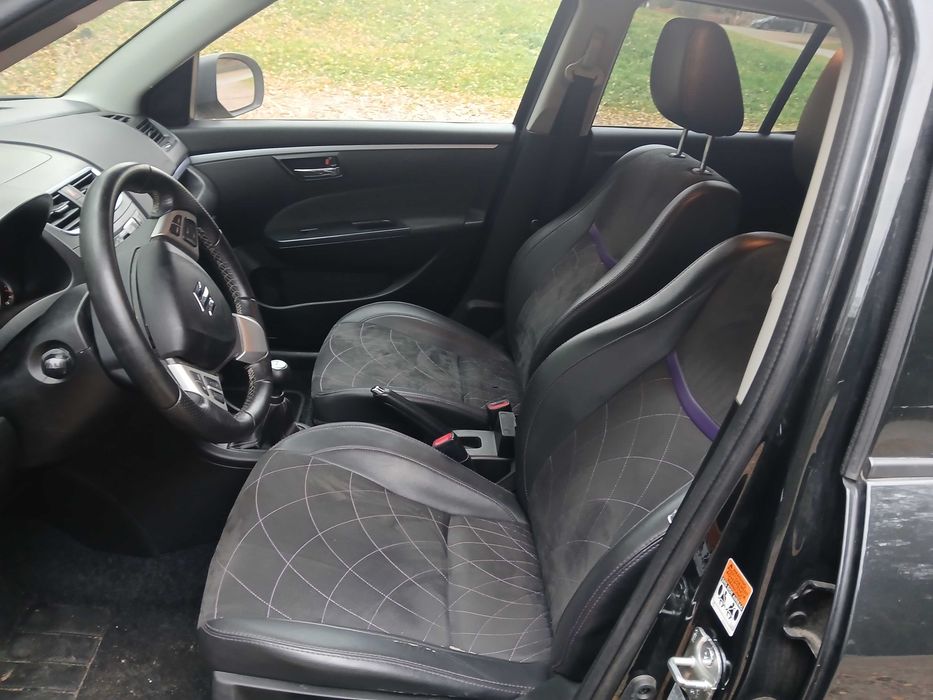 Suzuki Swift  X -TRA