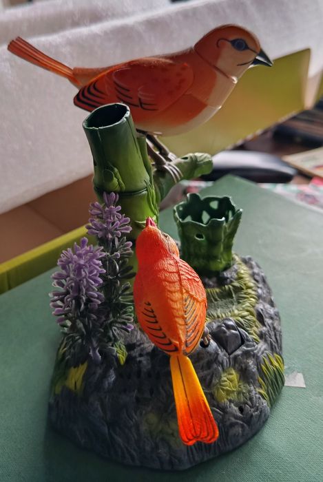 Peça decorativa com pássaros