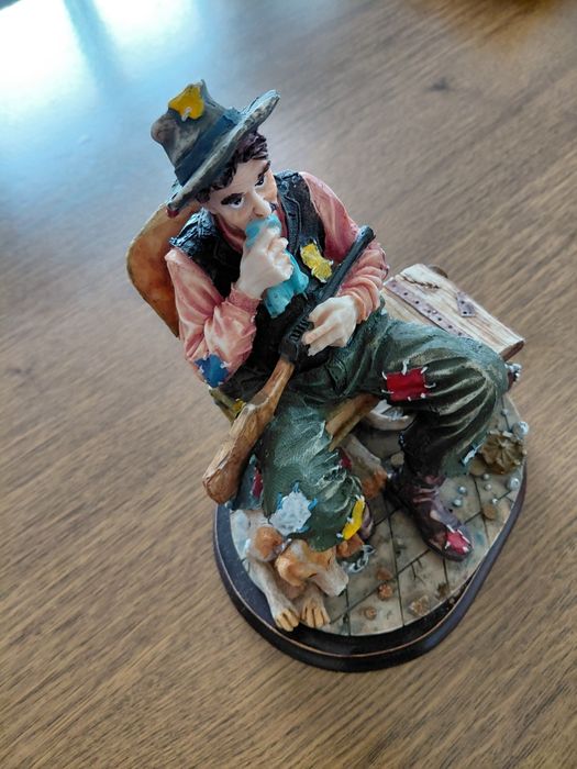 Estatueta porcelana