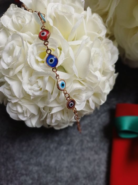 Novo! Pulseira olho grego+ bolsa veludo !