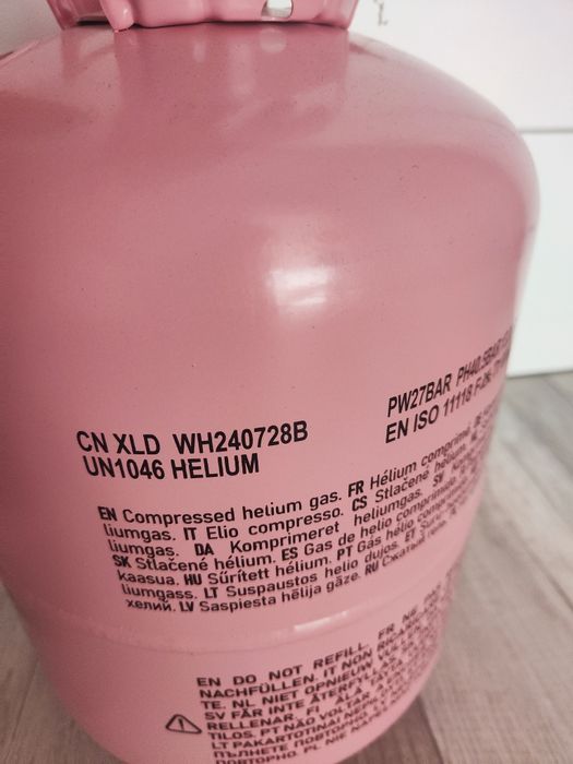 Pusta butla po helu różowa stan idealny