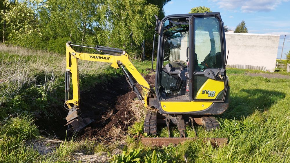 Mini koparka na wynajem, usługi minikoparką