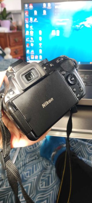 Nikon 5200, Lente, 2 baterias e uma mochila e mais coisas