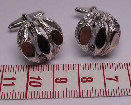 Srebrne spinki ciekawe ozdoby