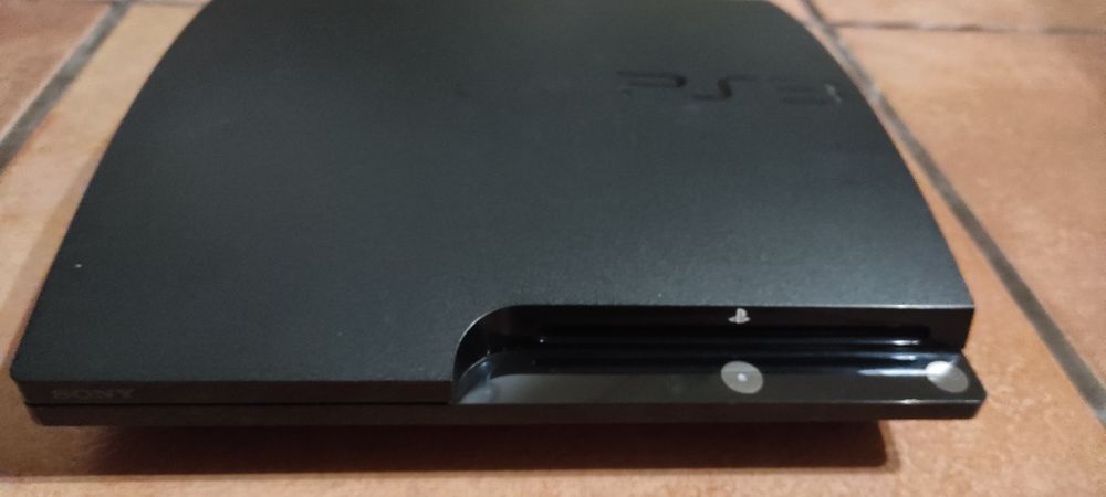 PS3 + Comando (2) + Comando MOVE(1) + Câmara (1)+ Jogos (13)