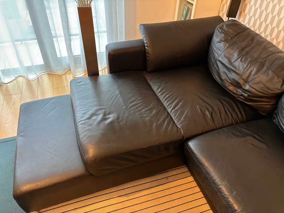 Sofá em pele preto com chaise long