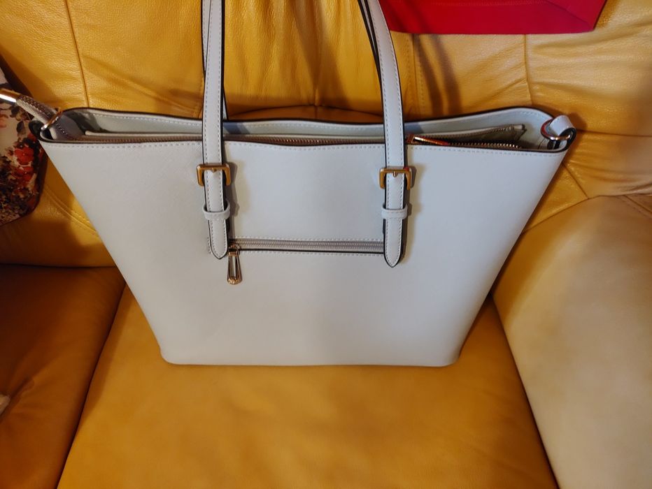 Jasno błekitna , pastelowa torebka flora&co na ramię, listonoszka