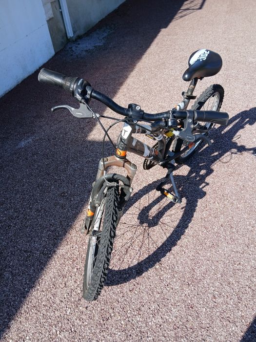 Bicicleta B'Twin Rockrider - roda 20  Full Suspension juvenil