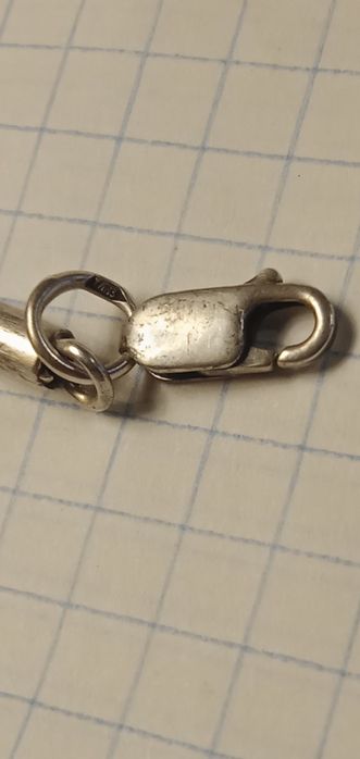 Шнурок з кожи та срібла.