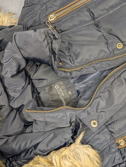 Zimowa kurtka z zamkiem do naprawy