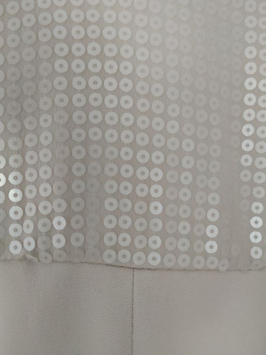 Kombinezon beżowy hm rozmiar 46