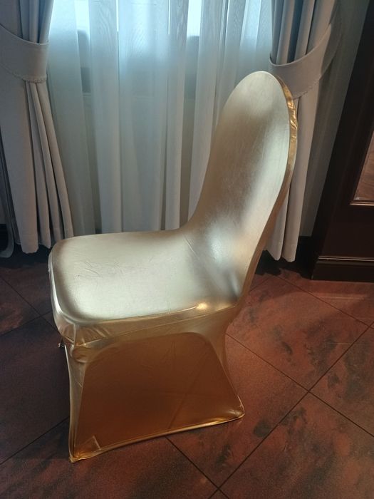 Pokrowce  na krzesła bankietowe złote, czarne i białe .Wynajem W-wa