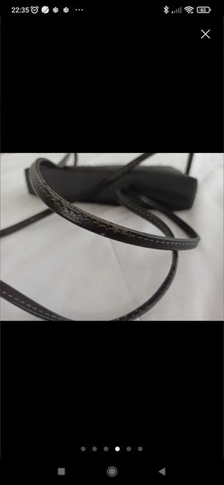 Mala tiracolo em pele