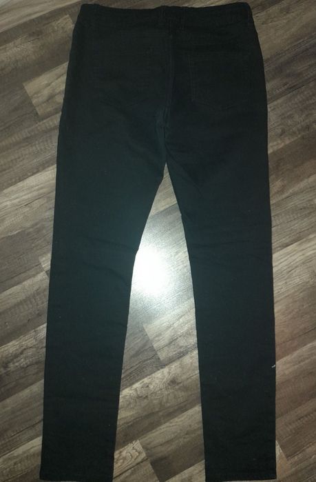 Jeansy damskie z dziurami Esmara 38 (M)