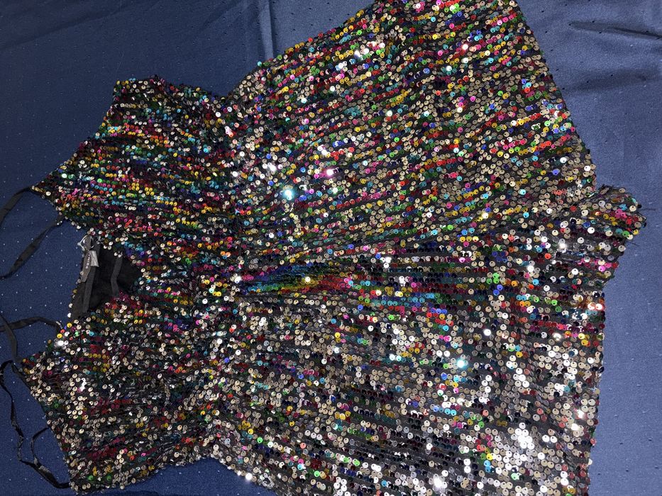 Комбінезон  в паєтках 16 розмір