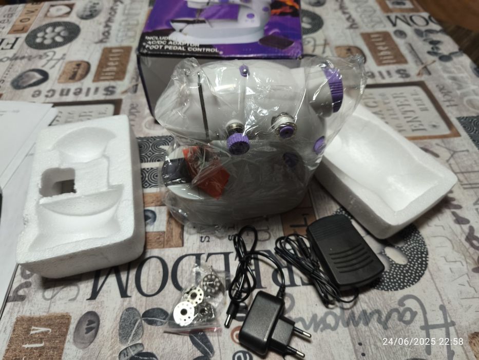 Maquina de costura portátil