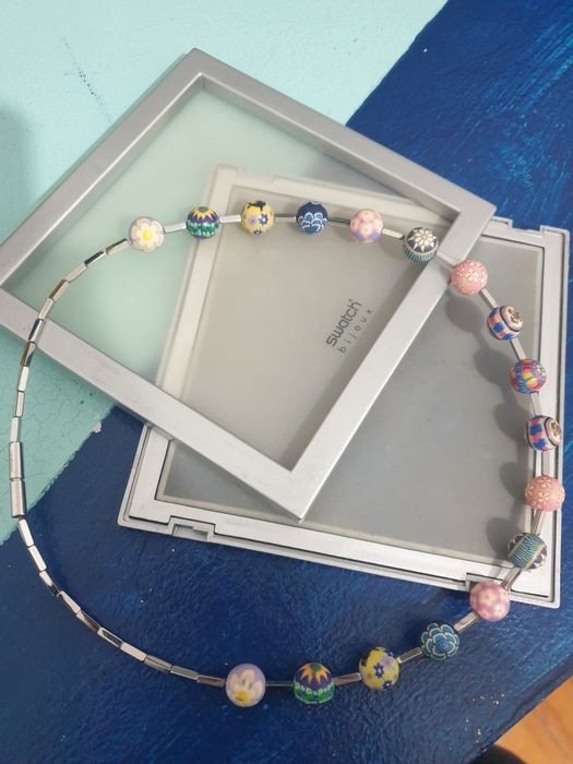 Colar com contas trabalhadas