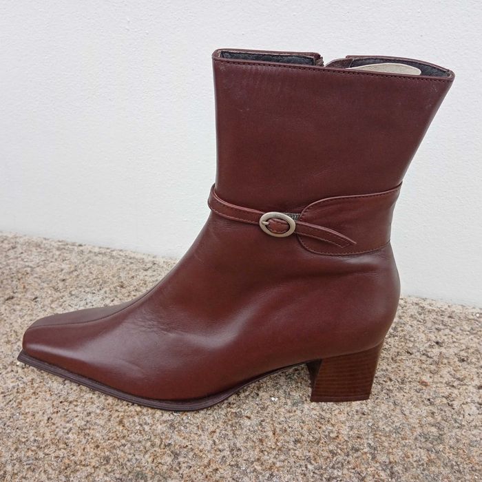 Botas cano alto novas