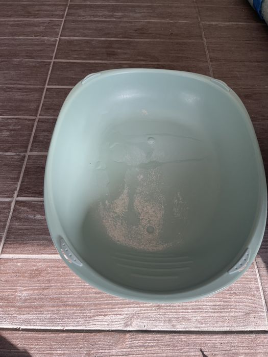 Caixa de areia usada  para doar