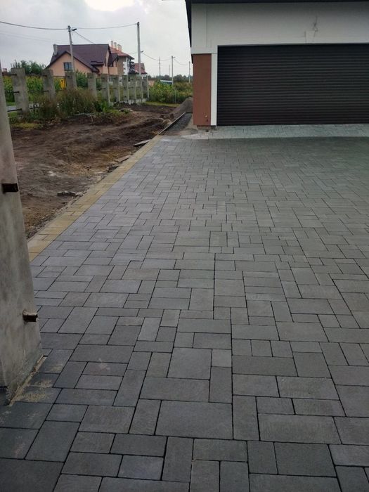 Укладання бруківки, вкладання бруківки, тротуарної плитки.