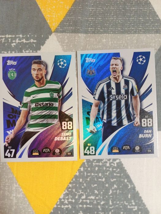 Karta kolekcjonerska Topps. Zeno Debast i Dan Burn