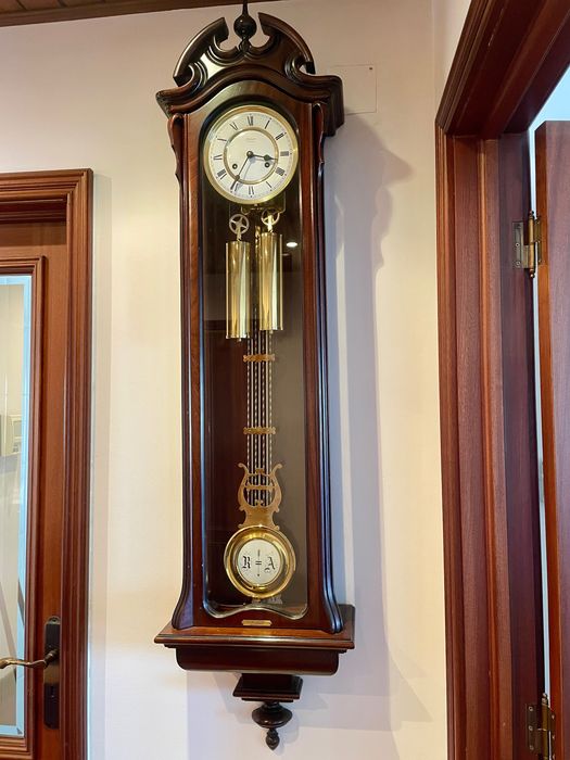 Relógio de parede de pêndulo