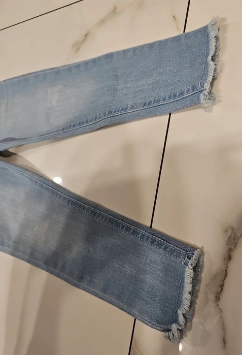 Primark jeansy na gumce 104 elastyczne jasny niebieski