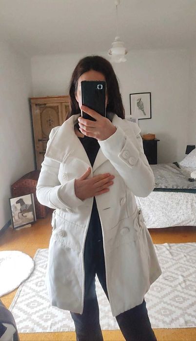 Casaco branco novo.