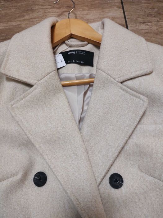 Śliczny nowy płaszczyk