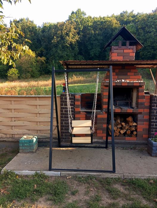 Качеля гойдалка дитяча