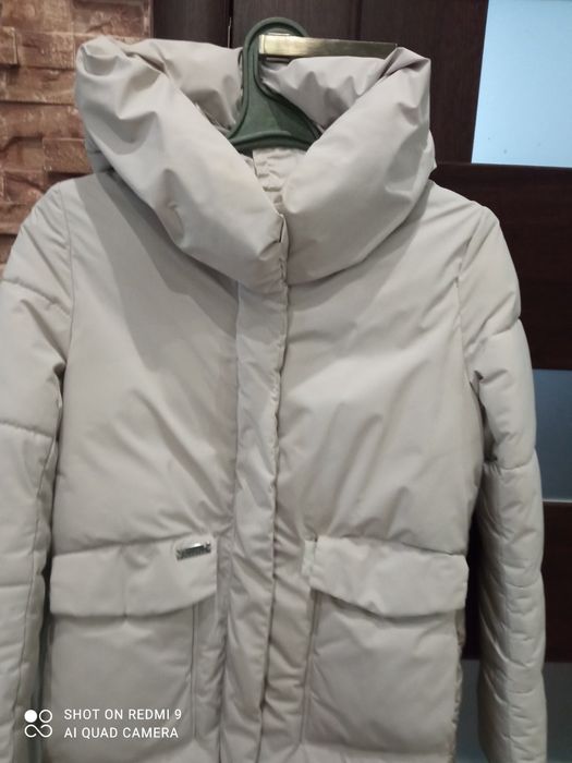 Продам пуховик  в гарному стані