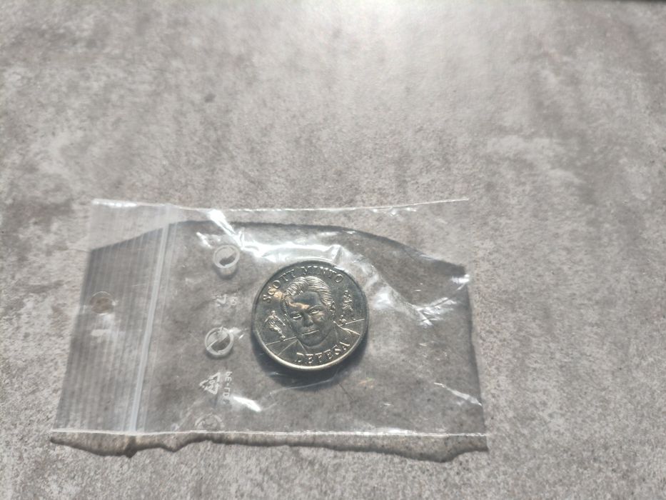 Moeda SLB Scott Minto