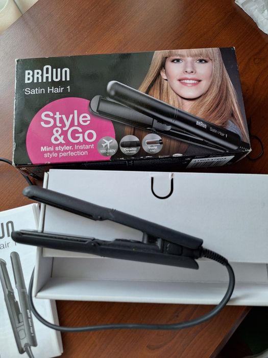 Продаю дорожный утюжок фирмы  BRAUN