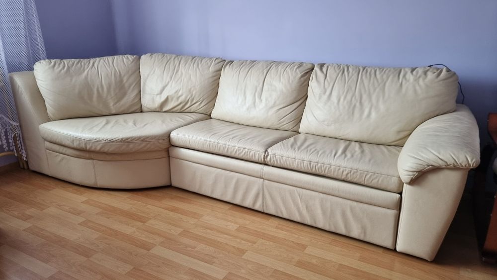 Narożnik kremowy skóra naturalna puf funkcja spania