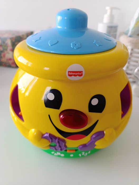 FISHER PRICE garnuszek na klocuszek