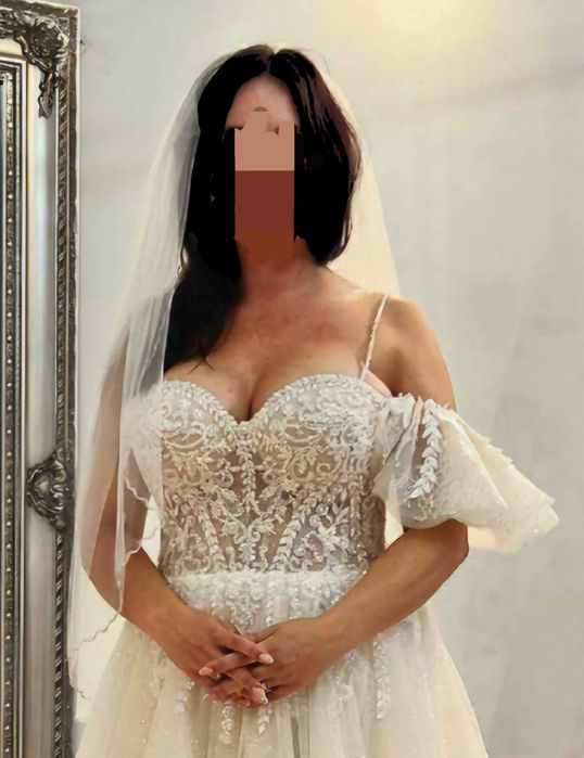 Przepiękna suknia ślubna z mieniącymi się drobinkami