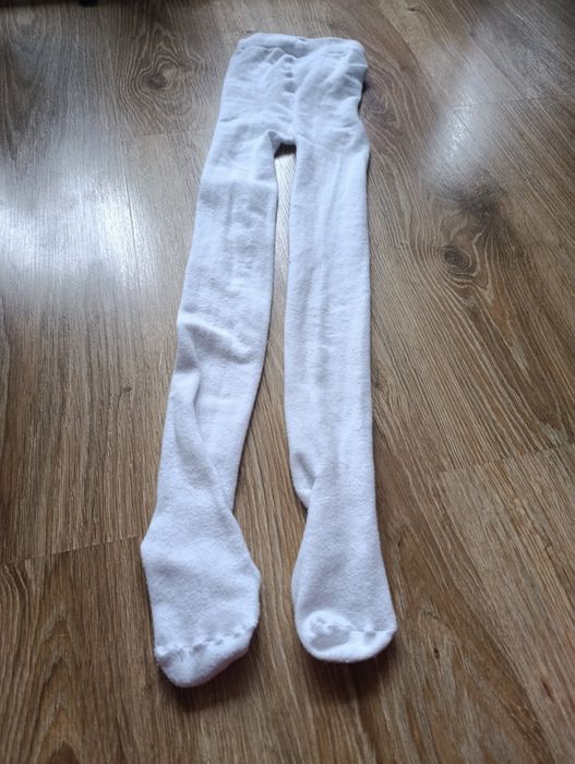 Białe rajstopy rozmiar 122-128