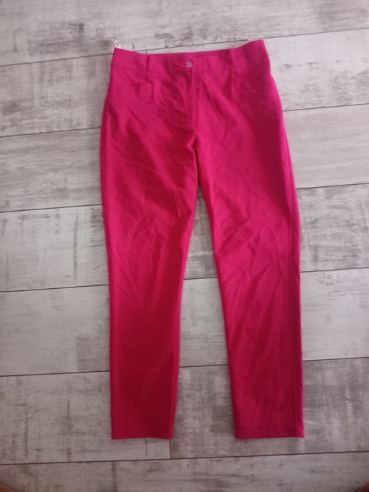 Eleganckie spodnie fuksja damskie